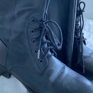 Melina, 8, Black boots.